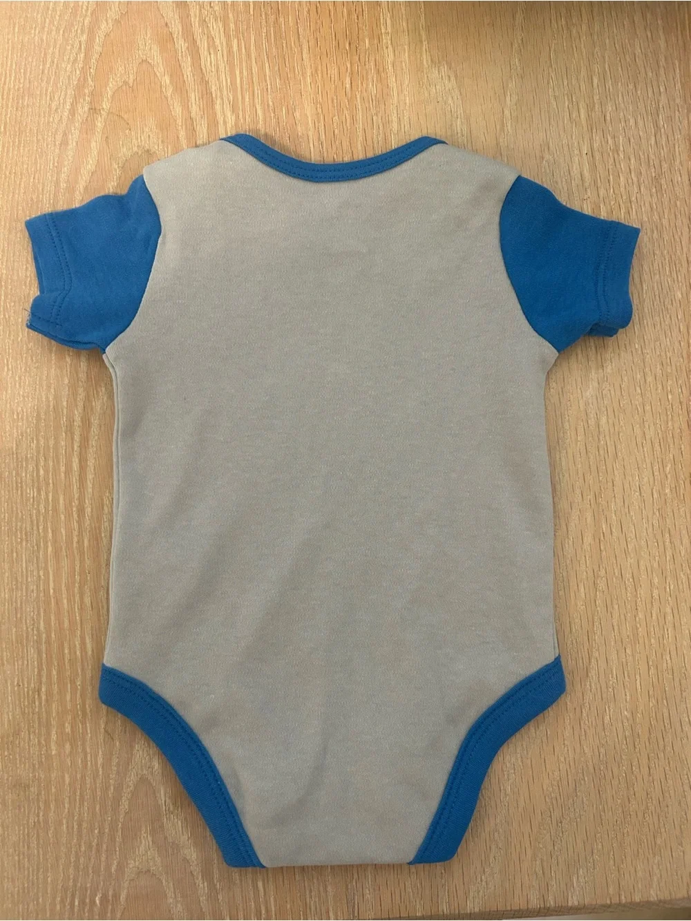 NFL Los Angeles Chargers Gray and Blue Baby One-Piece with Yellow Bolt